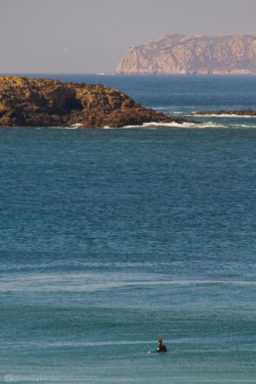 Surfer and scenery. Razo, Galicia.