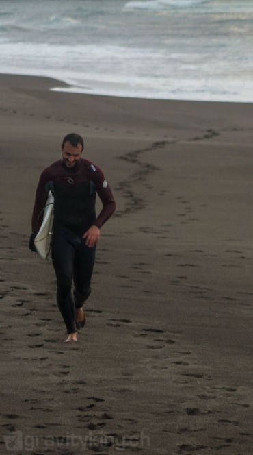 Coming back from a good surf session.